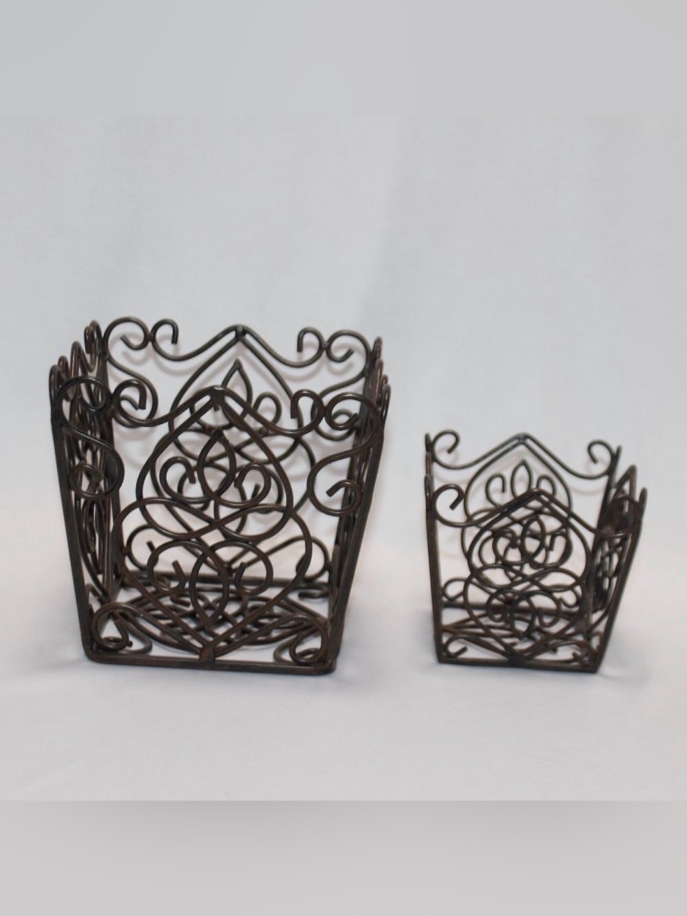 2 for $30: Southern Living  The Rosedale Plant Holder set of two in brown metal.